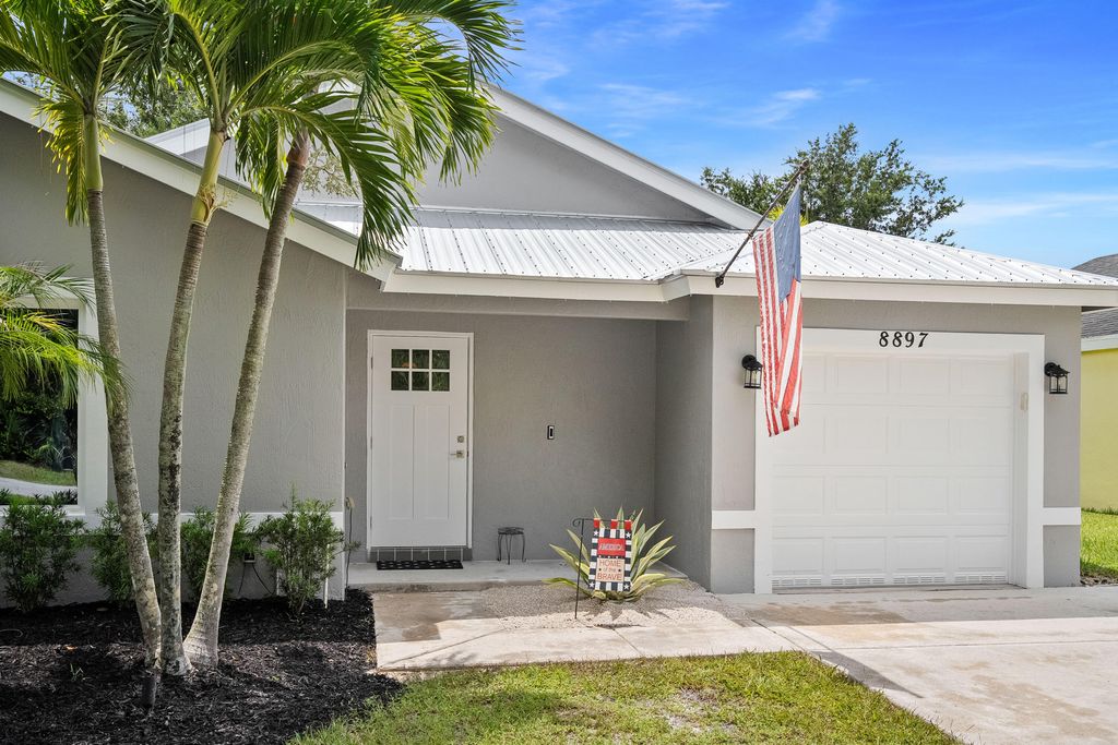 Photo of 8897 SW Fishermans Wharf Drive Drive, Stuart, FL 34997 (MLS # RX-11128083)