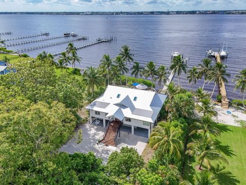 Photo of 90 NW Alice Street, Jensen Beach, FL 34957 (MLS # RX-11118787)