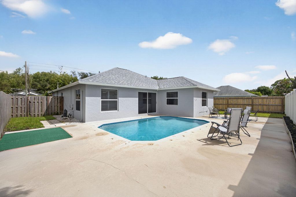 Photo of 6394 Drake Street, Jupiter, FL 33458 (MLS # RX-11129748)