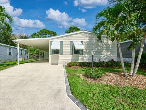 Photo of 4280 SE Sweetwood Way, Stuart, FL 34997 (MLS # RX-11127798)