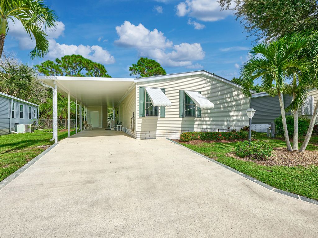 Photo of 4280 SE Sweetwood Way, Stuart, FL 34997 (MLS # RX-11127798)