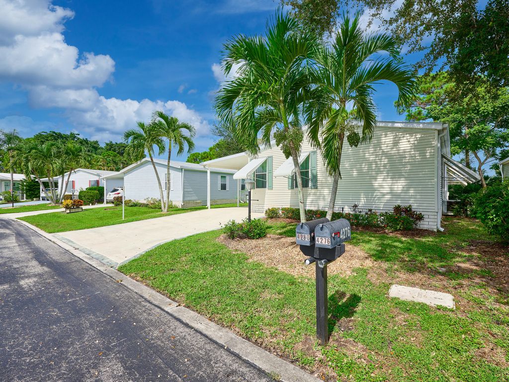 Photo of 4280 SE Sweetwood Way, Stuart, FL 34997 (MLS # RX-11127798)