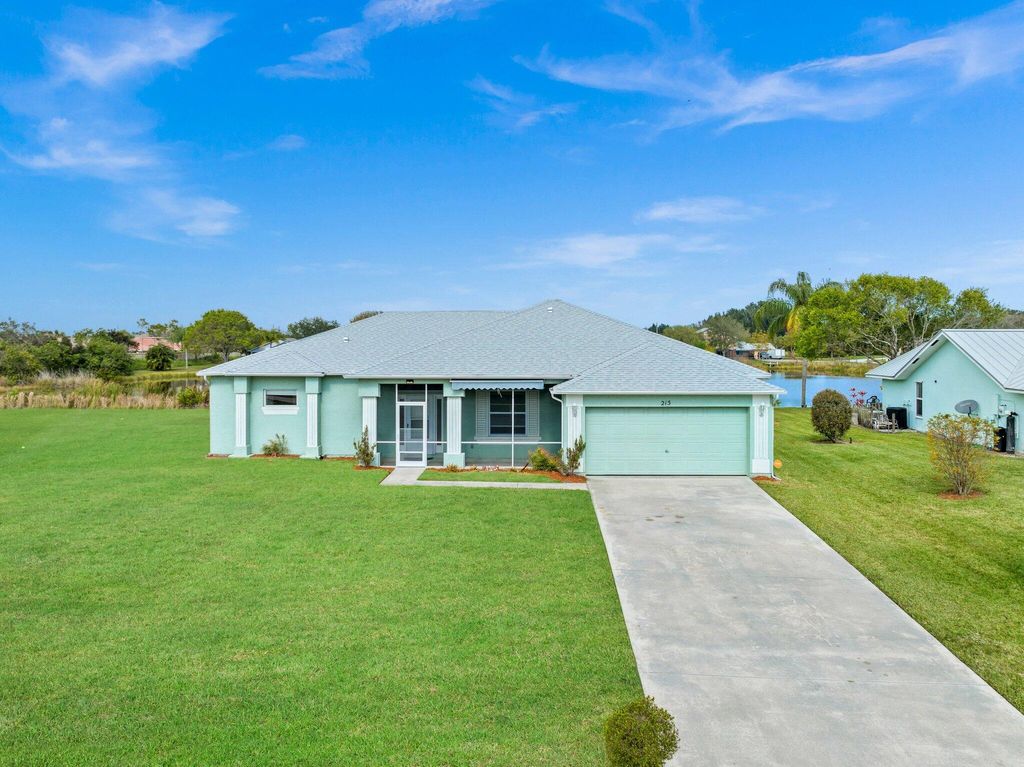 Photo of 215 Deerwood Lane, Fort Pierce, FL 34947 (MLS # RX-10860784)