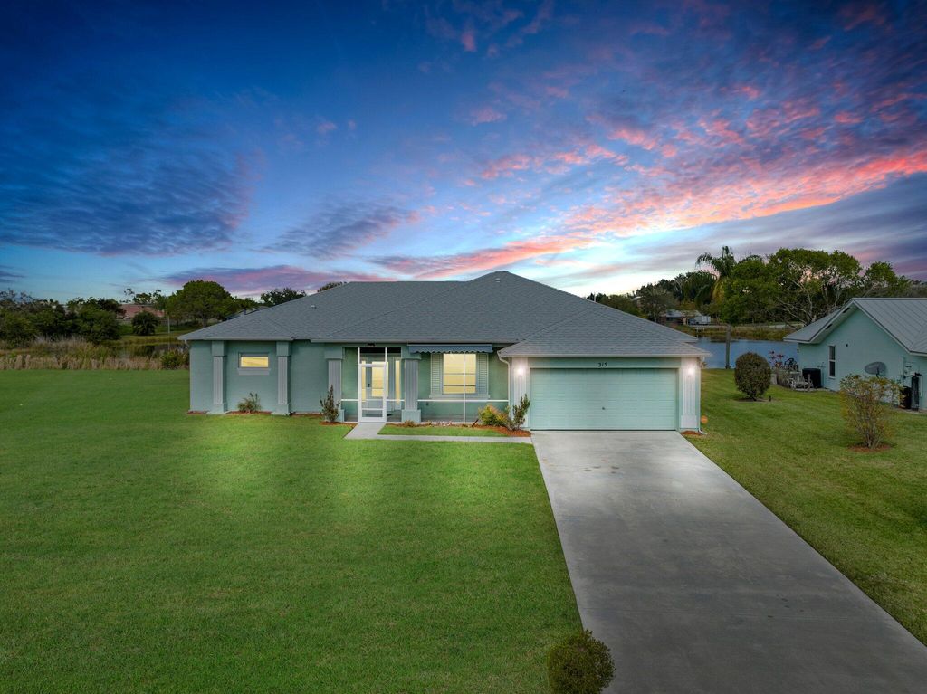 Photo of 215 Deerwood Lane, Fort Pierce, FL 34947 (MLS # RX-10860784)