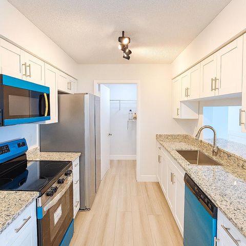 Photo of 4055 NW Cinnamon Tree Circle, Jensen Beach, FL 34957 (MLS # RX-11080947)