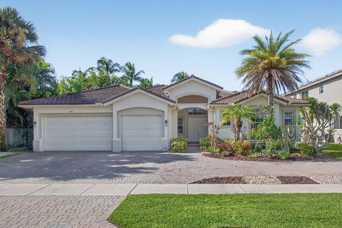 Photo of 11792 Osprey Pointe Circle, Wellington, FL 33449 (MLS # RX-11121289)