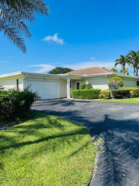 Photo of 13564 Whispering Lakes Lane, Palm Beach Gardens, FL 33418 (MLS # RX-11123147)