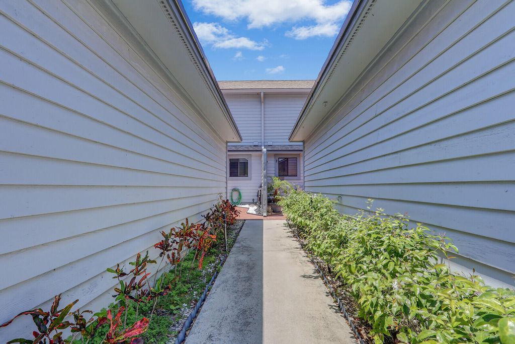 Photo of 6148 SE Georgetown Place #805, Hobe Sound, FL 33455 (MLS # RX-11089415)