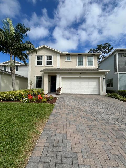 Photo of 6607 Pointe Of Woods Drive, West Palm Beach, FL 33413 (MLS # RX-11125513)