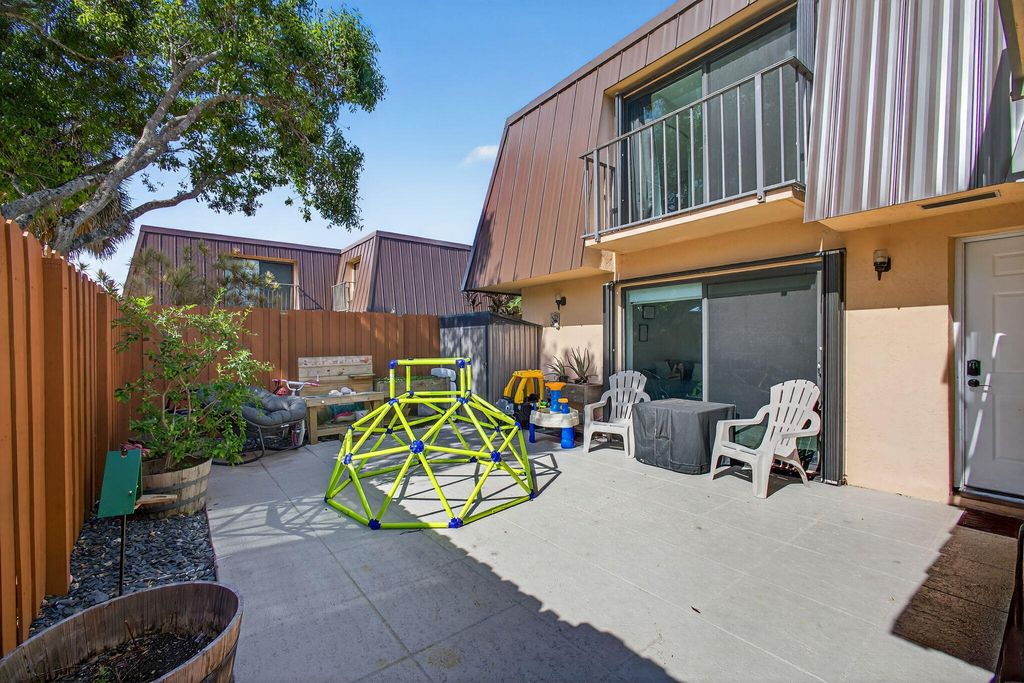 Photo of 5680 SE Windsong Lane #345, Stuart, FL 34997 (MLS # RX-11100877)