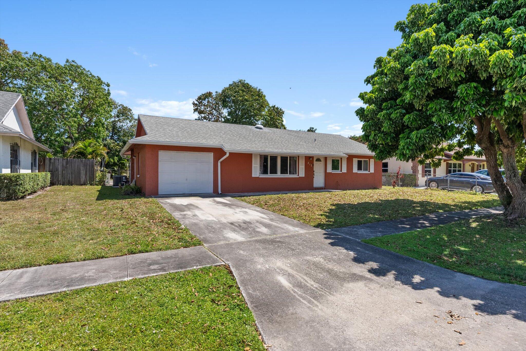 212 Wrena Drive, West Palm Beach, Palm Beach County, Florida - 3 Bedrooms  
2 Bathrooms - 