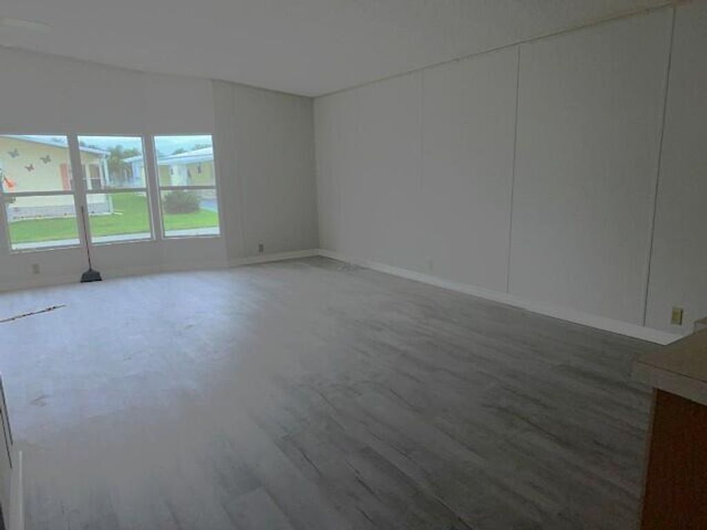 Photo of 6516 Spanish Lakes Blvd Boulevard, Fort Pierce, FL 34951 (MLS # RX-11124787)