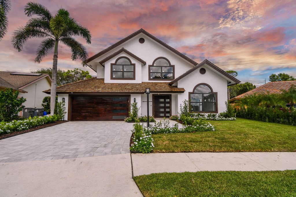 Photo of 12884 Calais Circle, West Palm Beach, FL 33410 (MLS # RX-10851571)