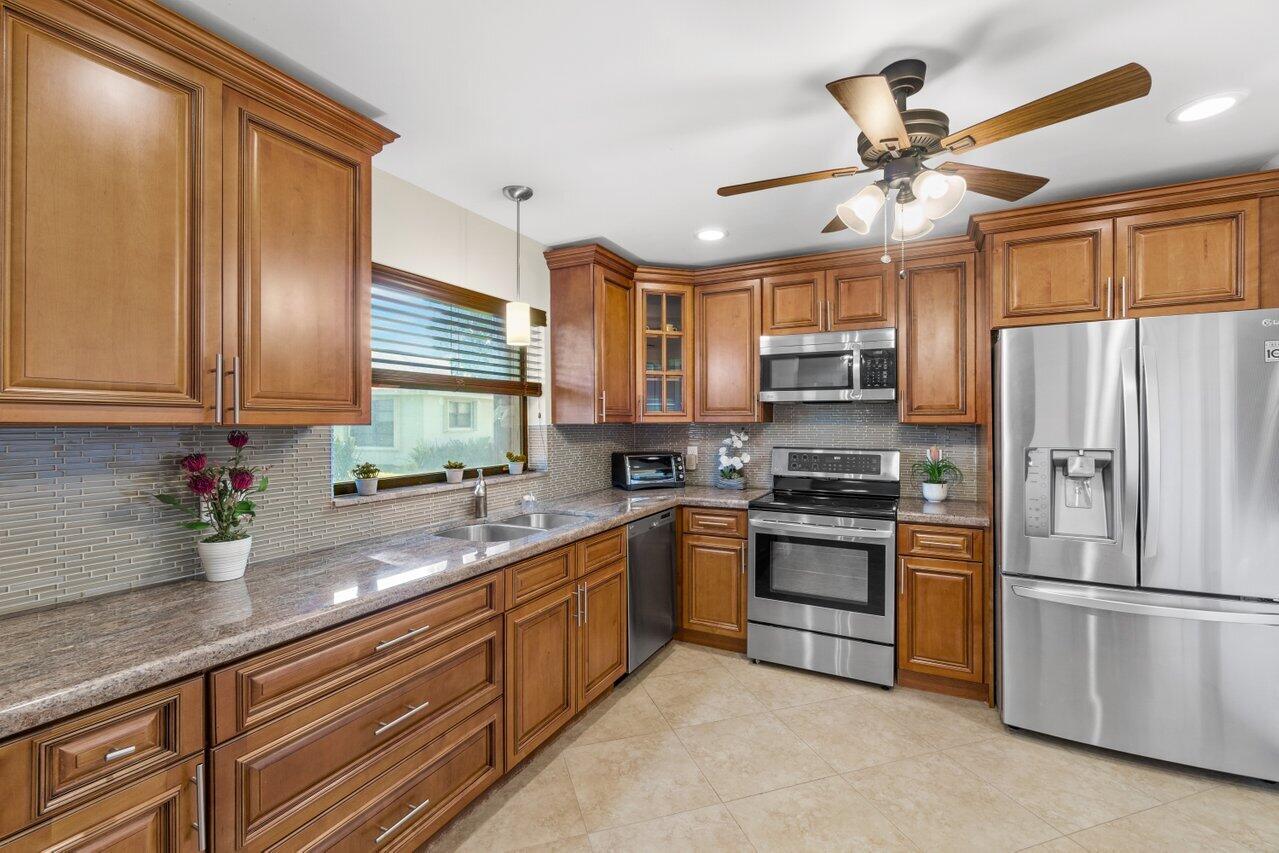 Property for Sale at 9780 Pecan Tree Drive A, Boynton Beach, Palm Beach County, Florida - Bedrooms: 2 
Bathrooms: 2  - $304,500