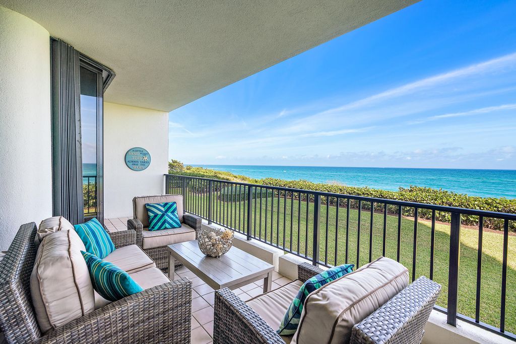 Photo of 800 Ocean Drive #203, Juno Beach, FL 33408 (MLS # RX-11076626)