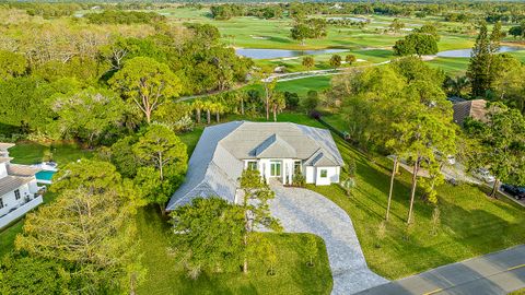 Photo of 18211 SE Old Trail Drive W, Jupiter, FL 33478 (MLS # RX-11112761)
