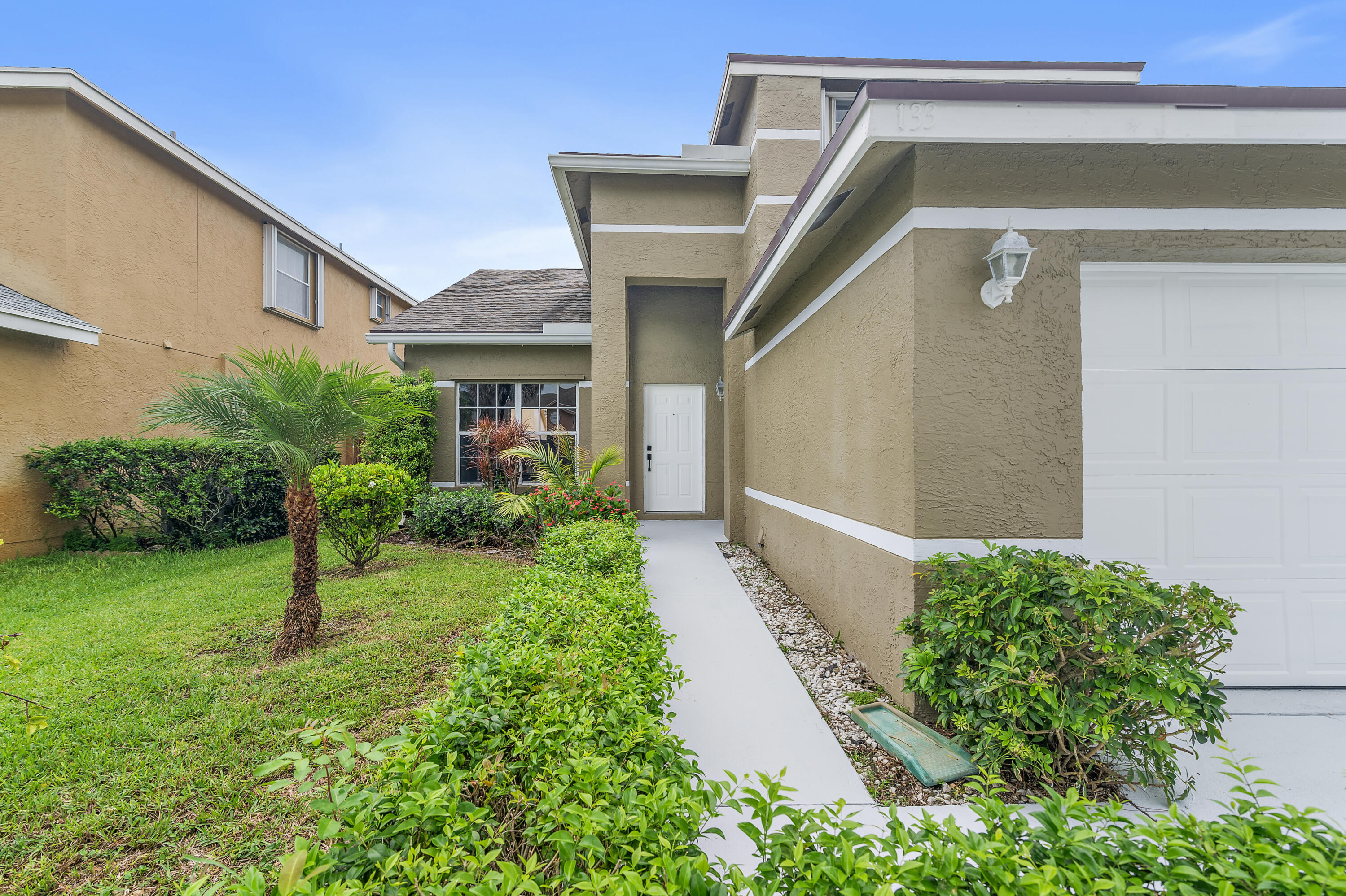 133 Heatherwood Drive, Royal Palm Beach, Palm Beach County, Florida - 4 Bedrooms  
3 Bathrooms - 