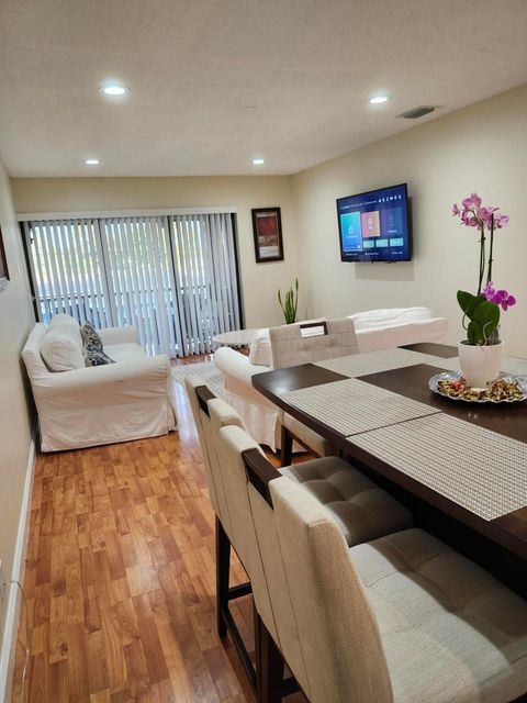 Photo of 5937 Forest Hill Blvd Blvd #205, West Palm Beach, FL 33415 (MLS # RX-11127967)
