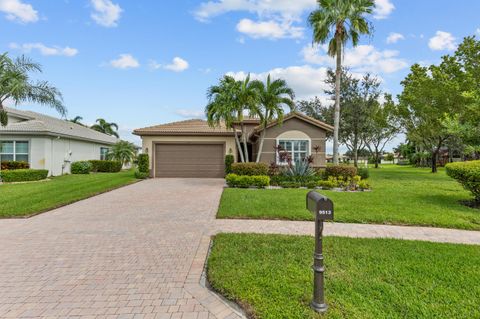 Photo of 9513 Isles Cay Drive, Delray Beach, FL 33446 (MLS # RX-11124421)