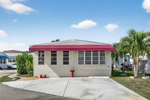 Photo of 91 Nettles Boulevard, Jensen Beach, FL 34957 (MLS # RX-11119061)