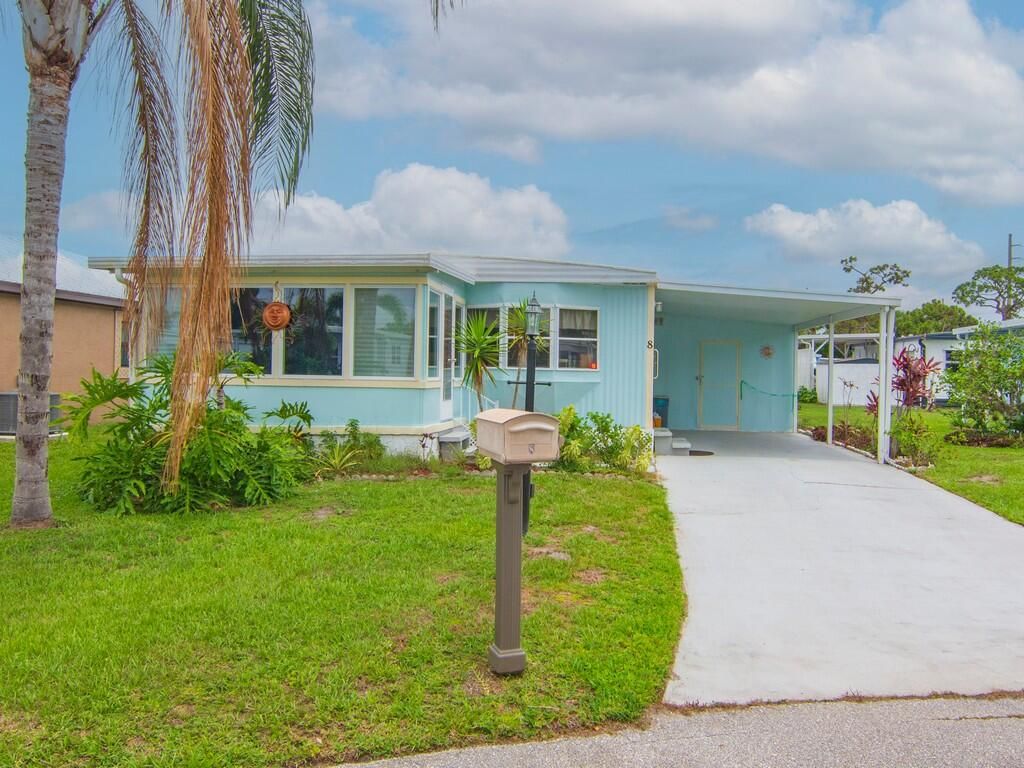 Photo of 8 Brisa Lane, Port Saint Lucie, FL 34952 (MLS # RX-11097612)