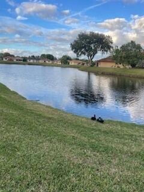 Photo of 1662 Granfern Avenue, West Palm Beach, FL 33415 (MLS # RX-11129466)