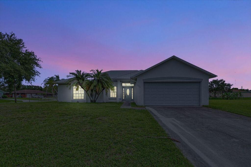 Photo of 300 Deerwood Lane, Fort Pierce, FL 34947 (MLS # RX-11011853)