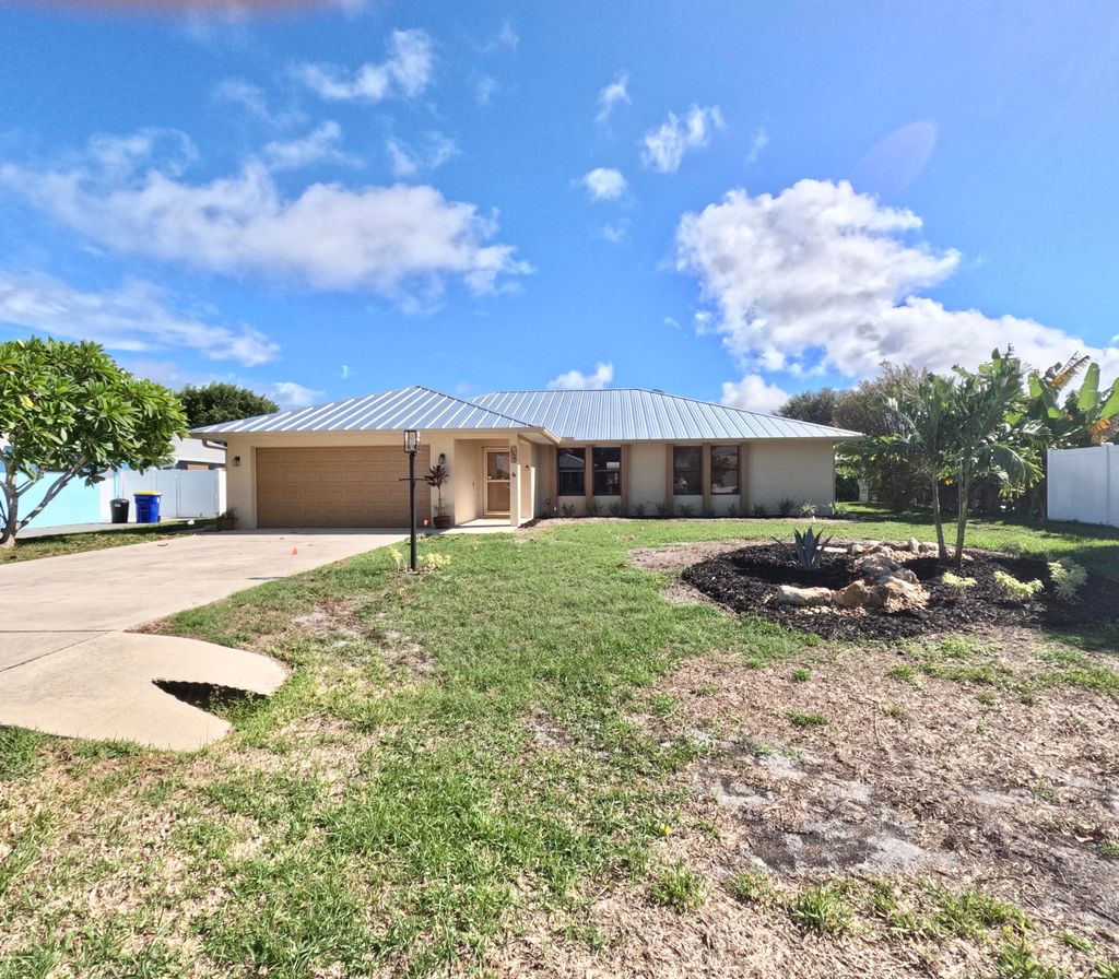 Photo of 1927 NE San Carlos Calle, Jensen Beach, FL 34957 (MLS # RX-11126589)