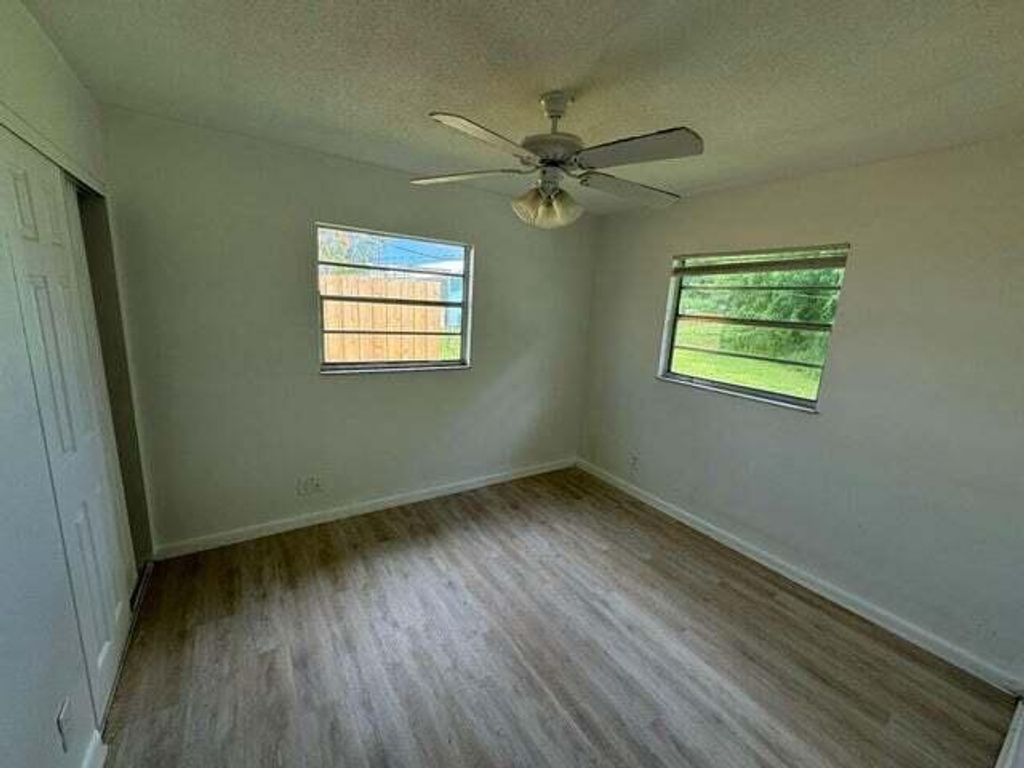 Photo of 2993 SE Camino Avenue, Stuart, FL 34997 (MLS # RX-11120801)