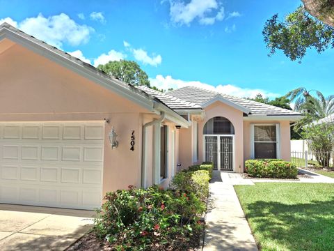 Photo of 7504 SE Marsh Fern Lane, Hobe Sound, FL 33455 (MLS # RX-11115170)
