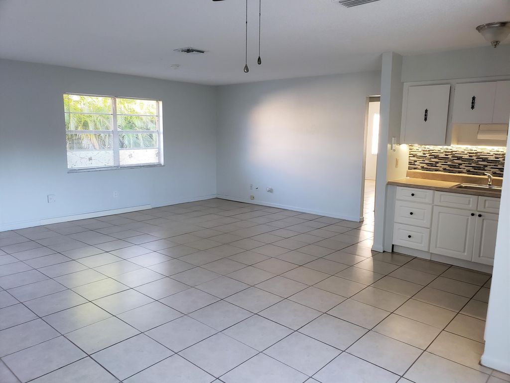 Photo of 4752 SE Ebbtide Avenue, Stuart, FL 34997 (MLS # RX-11037054)