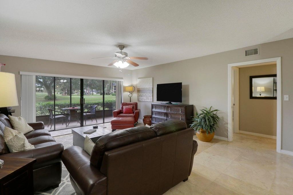 Photo of 9440 Meadowood Drive #103, Fort Pierce, FL 34951 (MLS # RX-11043083)