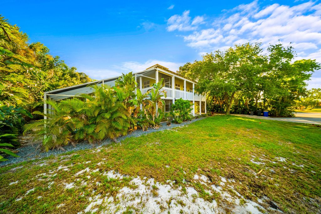 Photo of 3900 NE Cheri Drive, Jensen Beach, FL 34957 (MLS # RX-11090766)