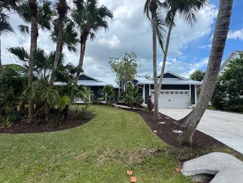Photo of 8737 SE Sharon Street, Hobe Sound, FL 33455 (MLS # RX-11118467)
