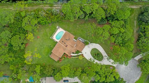 Photo of 17520 Bridle Court NW, Jupiter, FL 33478 (MLS # RX-11120524)