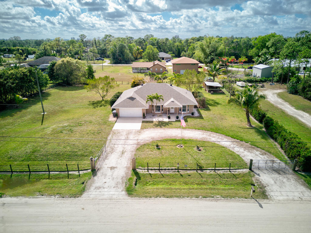 Property for Sale at 13332 N 77th Place, West Palm Beach, Palm Beach County, Florida - Bedrooms: 4 
Bathrooms: 2  - $725,000