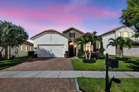 Photo of 9123 Grand Prix Lane, Boynton Beach, FL 33472 (MLS # RX-11129600)
