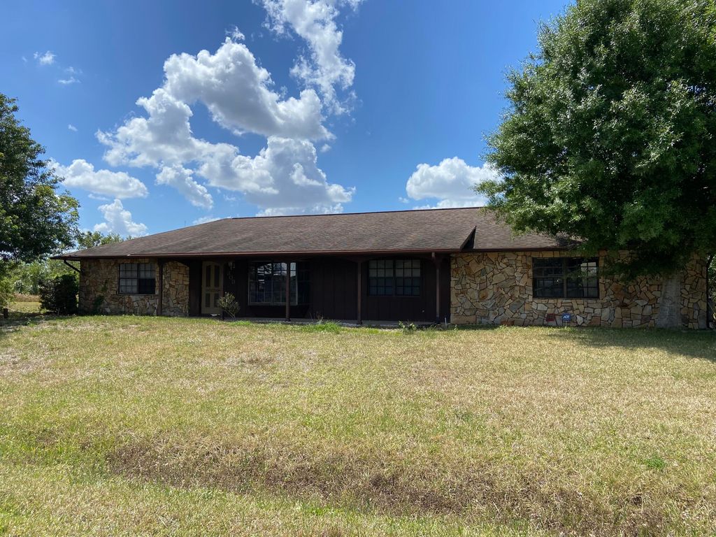 Photo of 303 Deerwood Lane, Fort Pierce, FL 34947 (MLS # RX-10878389)