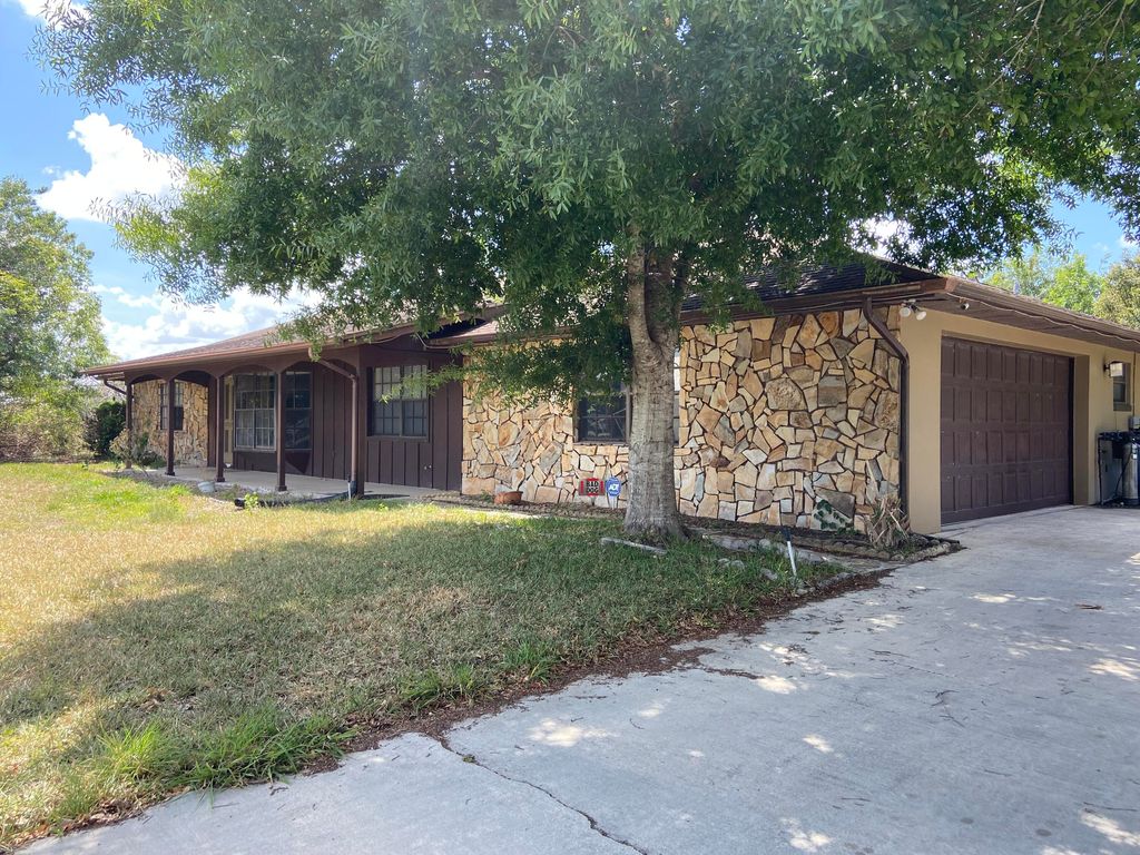 Photo of 303 Deerwood Lane, Fort Pierce, FL 34947 (MLS # RX-10878389)