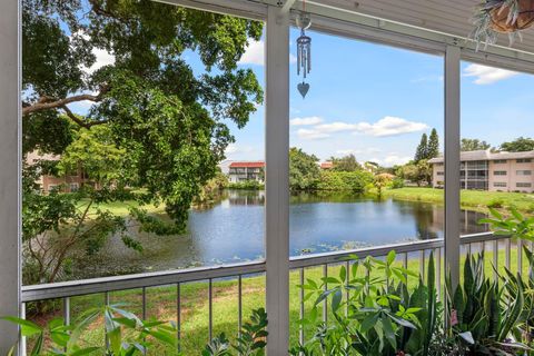 Photo of 2850 Forest Hills Boulevard #201, Coral Springs, FL 33065 (MLS # RX-11129472)