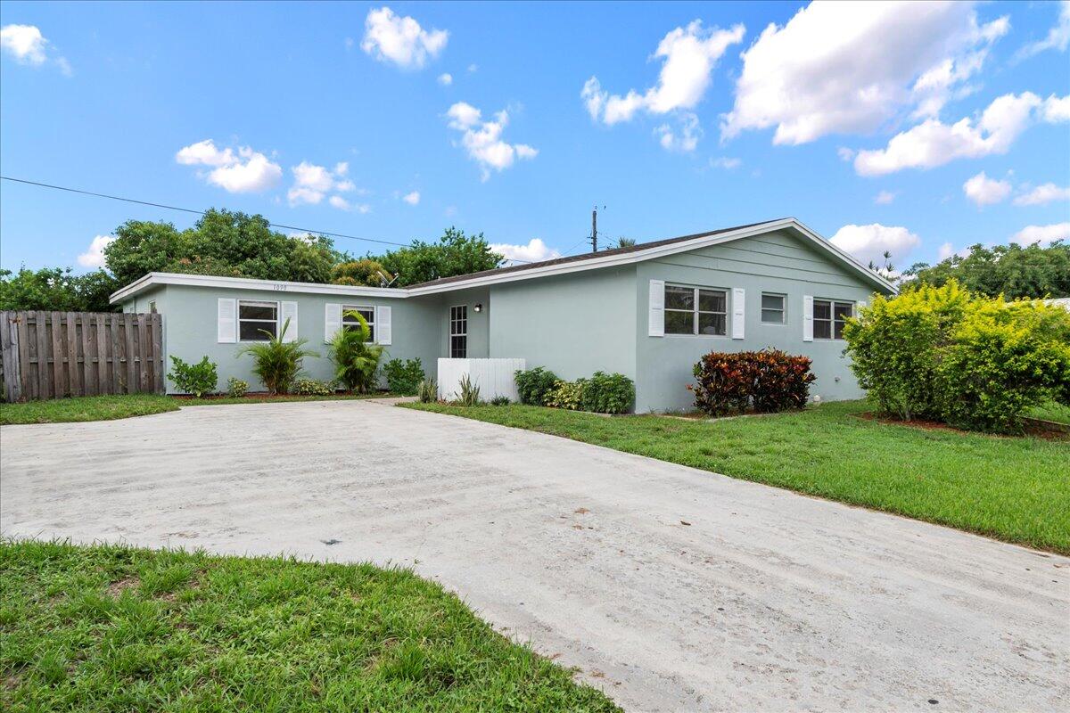 Property for Sale at 1090 W Woodcrest Road, West Palm Beach, Palm Beach County, Florida - Bedrooms: 4 
Bathrooms: 2  - $462,500