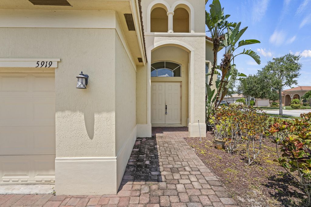 Photo of 5919 Walnut Park Ln Lane, Fort Pierce, FL 34951 (MLS # RX-11109815)