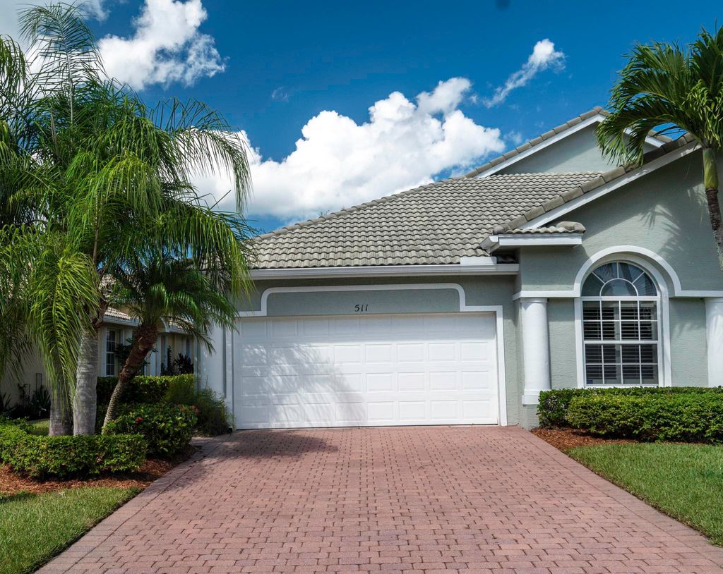 Photo of 511 NW Red Pine Way, Jensen Beach, FL 34957 (MLS # RX-10915884)