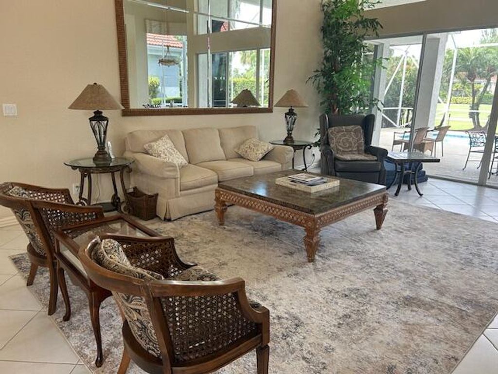 Photo of 125 Windward Drive, Palm Beach Gardens, FL 33418 (MLS # RX-11102933)