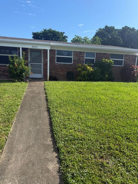 Photo of 3533 Florida Boulevard, Palm Beach Gardens, FL 33410 (MLS # RX-11119924)