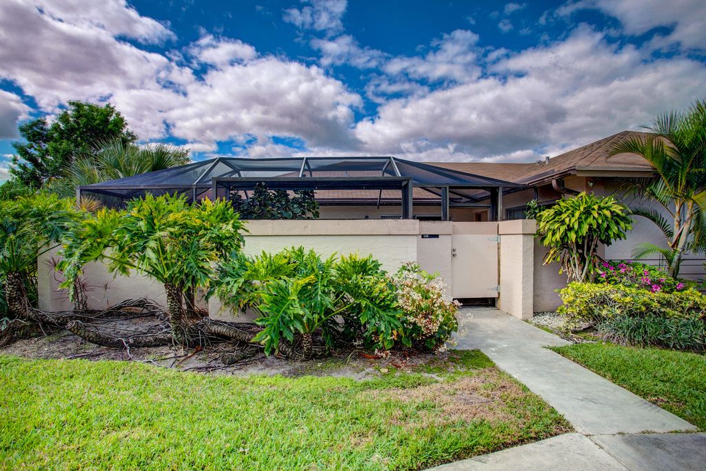 Photo of 112 Bent Arrow Drive #B, Jupiter, FL 33458 (MLS # RX-10979513)