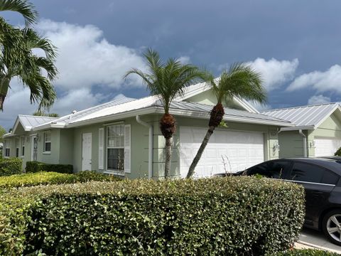 Photo of 1624 SW Waterfall Boulevard, Palm City, FL 34990 (MLS # RX-11123756)