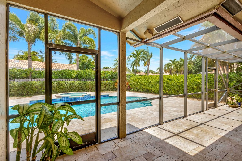 Photo of 2877 Biarritz Drive, Palm Beach Gardens, FL 33410 (MLS # RX-10900887)