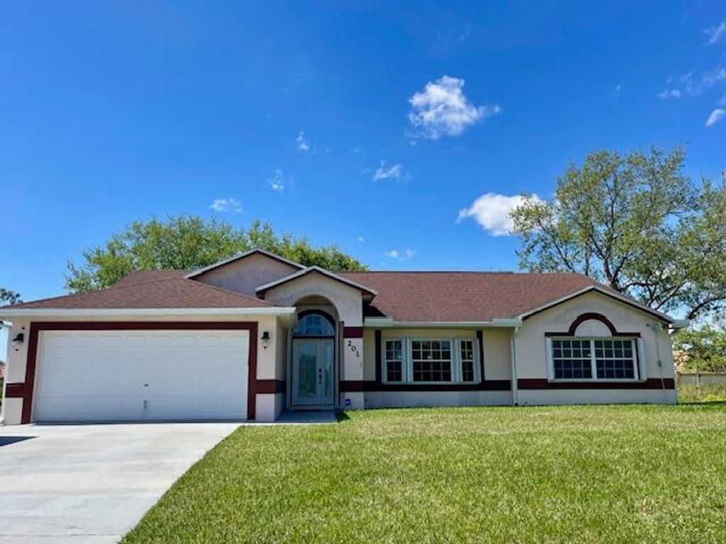 Photo of 201 Sandalwood Drive, Fort Pierce, FL 34947 (MLS # RX-10973832)