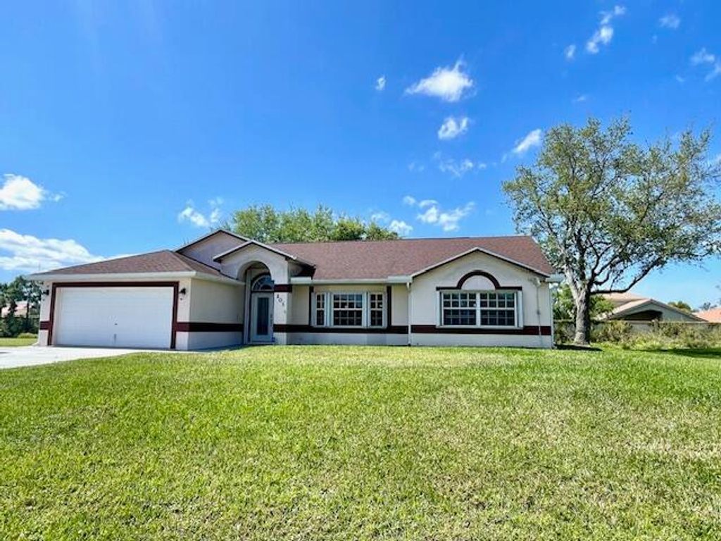 Photo of 201 Sandalwood Drive, Fort Pierce, FL 34947 (MLS # RX-10973832)